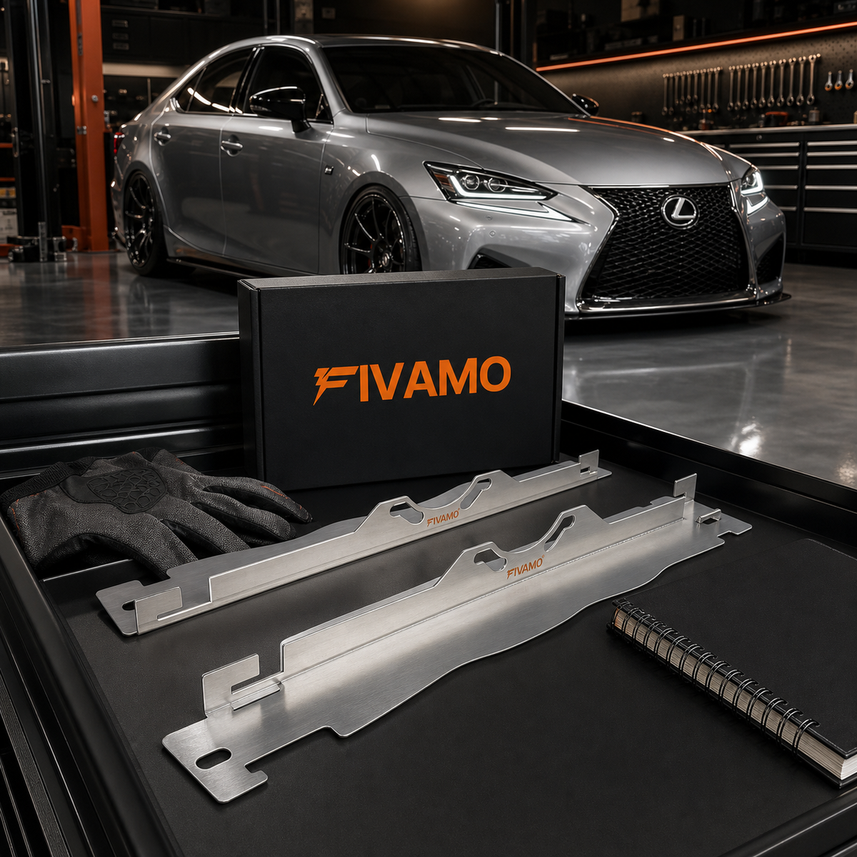 Two FIVAMO toe alignment plates and branded box on a workshop cart